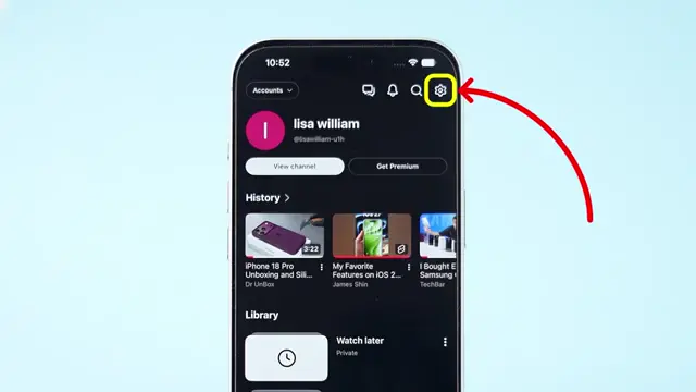 Access Settings Settings icon in the top right corner of the YouTube app.